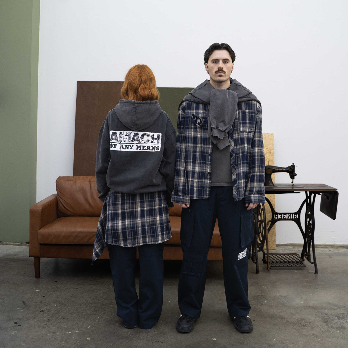 AMACH By Any Means vintage black hoodie with back print, worn with the plaid shirt