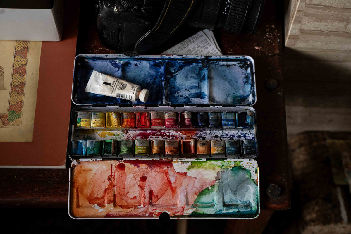 A well-used watercolour paint box, from the Jim Fitzpatrick × AMACH shoot